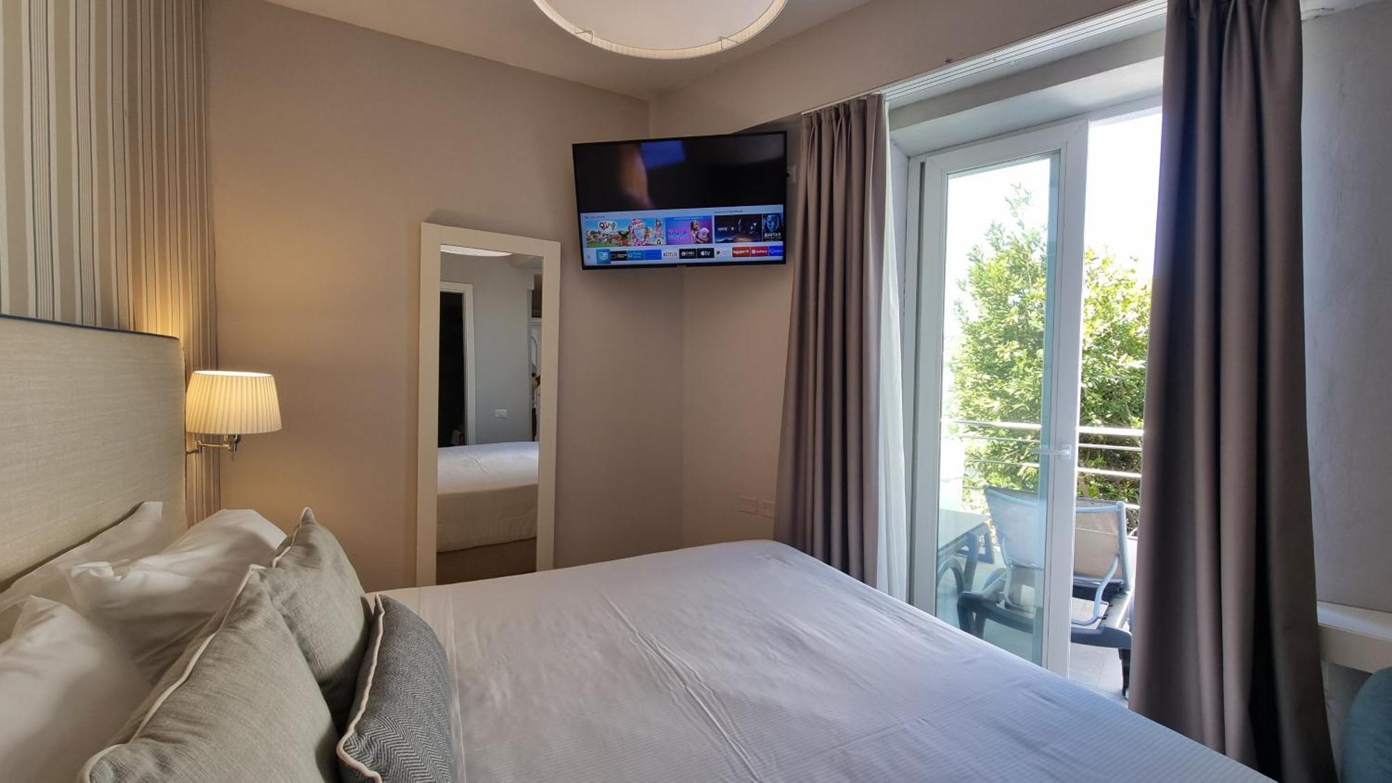 Hotel Plaza Porto Azzurro Phòng bức ảnh